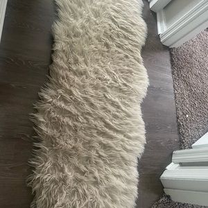 Beige fuzzy rug